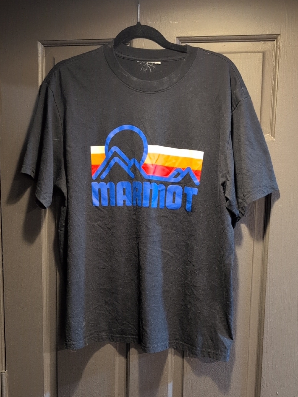 Marmot Black Tee with Blue Logo and Sunset Stripes